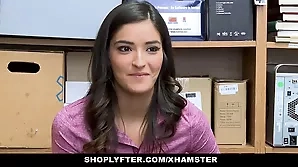 A beautiful young woman with wavy brown hair is caught in the act and taken to the backroom by the shop owner.