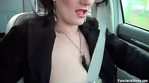 A white European woman seduces and gives a rough hand job in her car.