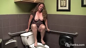 Natural blonde housewife's homemade video of her public restroom escapade