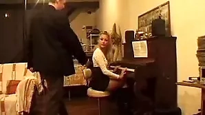 A detailed look at a slim teenager’s anal pleasure while giving a piano lesson